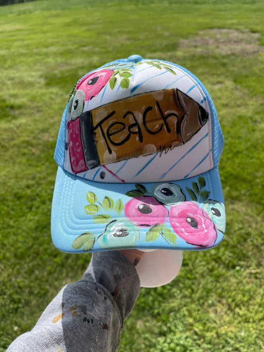 Hand painted floral teacher hat on blue